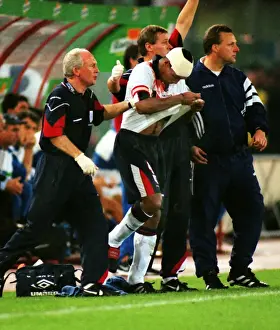 Images Dated 22nd June 2012: A bloodied Paul Ince during Englands famous draw with Italy in Rome in 1998