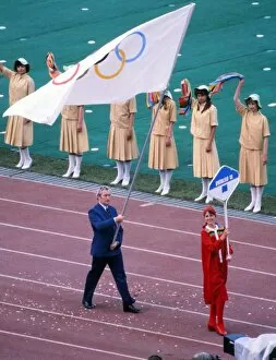 Images Dated 16th December 2011: BOA official Dick Palmer carries the Olympic flag for Great Britain during the Opening Ceremony of