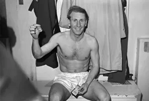 1963 FA Cup Final - Manchester United 3 Leicester City 1 Collection: Bobby Charlton with his 1963 FA Cup winners medal