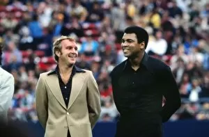 Pele's Farewell Game Collection: Bobby Moore and Muhammad Ali share a joke at Peles farewell game