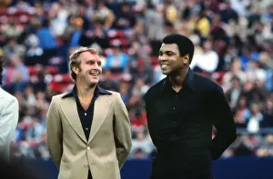 Bobby Moore and Muhammad Ali share a joke at Peles farewell game