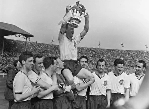 Bolton Wanderers captain Nat Lofthouse is chaired by his teammates after victory in the 1958 FA Cup Final