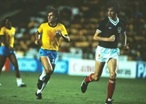 Images Dated 7th September 2010: Brazils Zico and Scotlands Alan Hansen during the 1982 World Cup