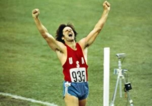 1976 Montreal Olympics Collection: Bruce Jenner celebrates winning decathlon gold at the 1976 Montreal Olympics