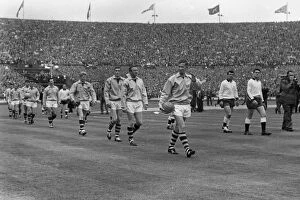 Images Dated 8th November 2011: Burnley captain Jimmy Adamson leads his side out for the 1962 FA Cup Final