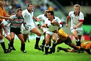 Images Dated 3rd August 2011: Will Carling looks for support at the 1995 Rugby World Cup