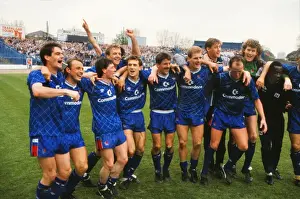 Chelsea players celebrate promotion to the First Division in 1989