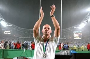 Images Dated 22nd November 2003: Clive Woodward applauds the crowd after the 2003 rugby World Cup final