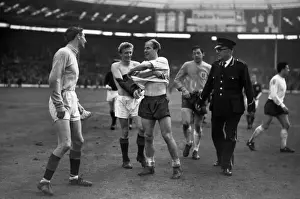 Soccer Prints: Club teammates Denis Law and Bobby Charlton exchange shirts during the 1965