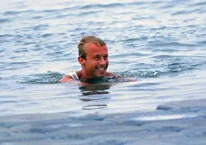 Cox Adrian Ellison is thrown into the water by his teammates as they celebrate their gold medal victory - 1984 Los Angeles Olympics