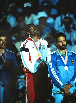 Daley Thompson enjoys himsef on the podium after winning his second Olympic gold medal