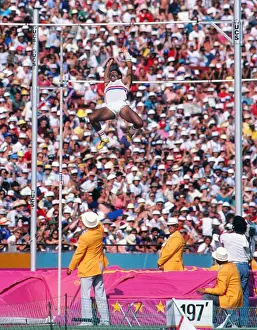 Daley Thompson soars over the bar during the decathlon pole vault at the 1984 Olympics