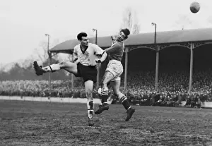 Darlingtons Ken Furphy and Chelseas Ron Tindall jump for a header during the 1958 FA Cup