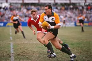 Images Dated 13th July 2012: David Campese on the ball for the ANZAC XV against the Lions in 1989