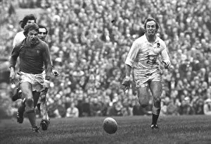 Images Dated 19th February 2009: David Duckham and Jean-Francois Gourdon race for the ball during the 1975 Five Nations