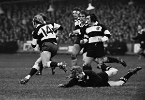 David Duckham makes a break for the Barbarians against the All Blacks in 1973