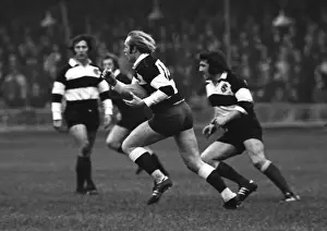 David Duckham runs with the ball for the Barbarians against the All Blacks in 1973