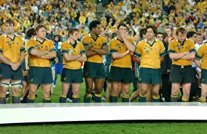 2003 Rugby World Cup Final Prints: Dejected Australian players line up to receive their losers medals