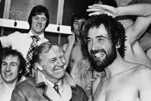 Dickie Guy and his Wimbledon teammates celebrate in the Elland Road changing rooms during the 1975 FA Cup