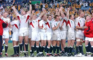 England players celebrate before receiving their World Cup winners medals