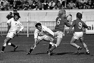Englands Andy Maxwell tackles Frances Jean-Pierre Rives - 1976 Five Nations