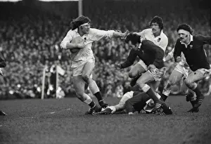 Englands Andy Ripley fends off Gareth Edwards - 1974 Five Nations
