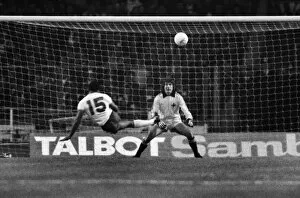 Images Dated 1980 May: Englands Cyrille Regis shoots at Northern Ireland goalkeeper Pat Jennings