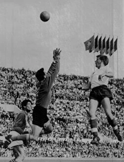 Images Dated 20th June 2012: Englands Gerald Hitchens lobs the Italian goalkeeper to score in 1961 +