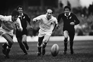 Images Dated 2nd November 2011: Englands Les Cusworth chases after the ball against the All Blacks in 1983