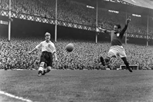 Images Dated 21st March 2012: Englands Tom Finney crosses against Portugal in 1951