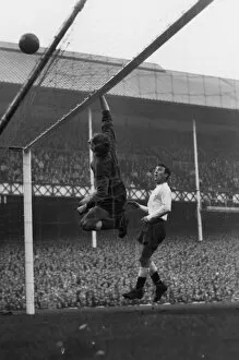 Spurs Collection: Everton goalkeeper Gordon West tips over a shot as Spurs Jimmy Greaves looks on at Goodison Park