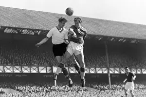 Evertons James Harris and Leeds Jack Charlton compete for a header