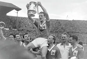 Forest captain Jack Burkitt lifts the trophy - 1959 FA Cup Final