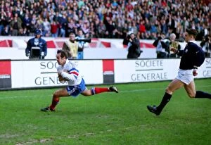 Images Dated 25th January 2012: Frances Philippe Saint-Andre scores against Scotland - 1995 Five Nations