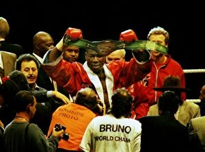 Images Dated 28th April 2011: Frank Bruno celebrates winning the WBC title after defeating Oliver McCall