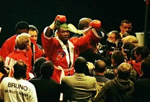 Images Dated 28th April 2011: Frank Bruno celebrates winning the WBC title after defeating Oliver McCall
