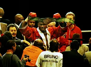 Frank Bruno celebrates winning the WBC title after defeating Oliver McCall