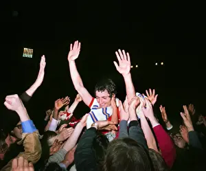 Frank McLintock celebrates with the fans after Arsenal win the 1971 league title