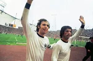 Franz Beckenbauer and Gerd Muller celebrate winning the 1974 World Cup