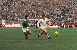 Images Dated 27th September 2010: Franz Beckenbauer and Paul Van Himst run for the ball at Euro 72