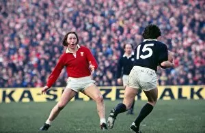 Images Dated 23rd October 2011: Fullbacks JPR Williams and Andy Irvine face-off in the 1977 Five Nations