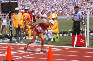 Images Dated 31st March 2011: Gabriela Andersen-Schiess struggles to complete the marathon - 1984 Los Angeles Olympics
