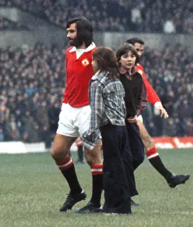 George Best is greeted by young fans before kick-off on his first team return for Manchester United in 1973