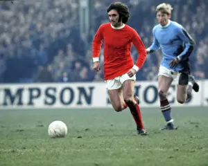George Best of Man Utd, chased by Colin Bell of Manchester 1969