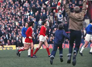 George Best and Shay Brennan run off the Old Trafford pitch after the last game of the 1968 / 9 season