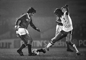 Images Dated 10th June 2011: Glenn Hoddle attempts to tackle George Best