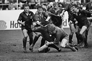 Images Dated 27th July 2012: Graham Price tackles Dave Loveridge - 1983 British Lions Tour to New Zealand