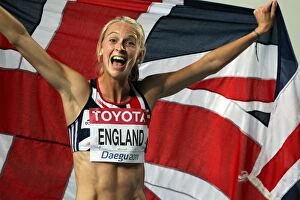 Images Dated 1st September 2011: Hannah England celebrates winning the 1500m World silver