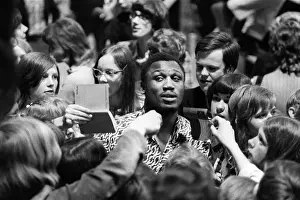 + Heavyweight boxer Joe Frazier of USA during an Autograph session in Berlin in 1971