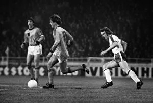 Images Dated 9th February 1977: Hollands Johnny Rep and Englands Kevin Beattie